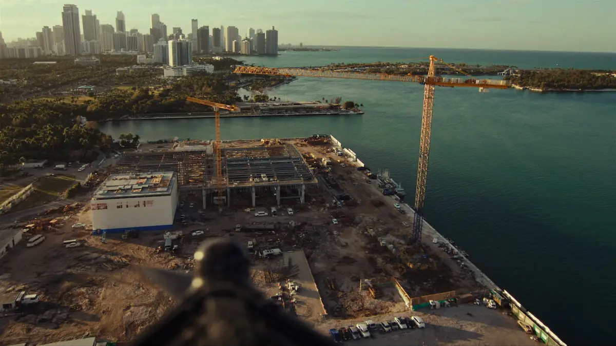 Aerial view of a Miami waterfront construction site captured by drone at golden hour